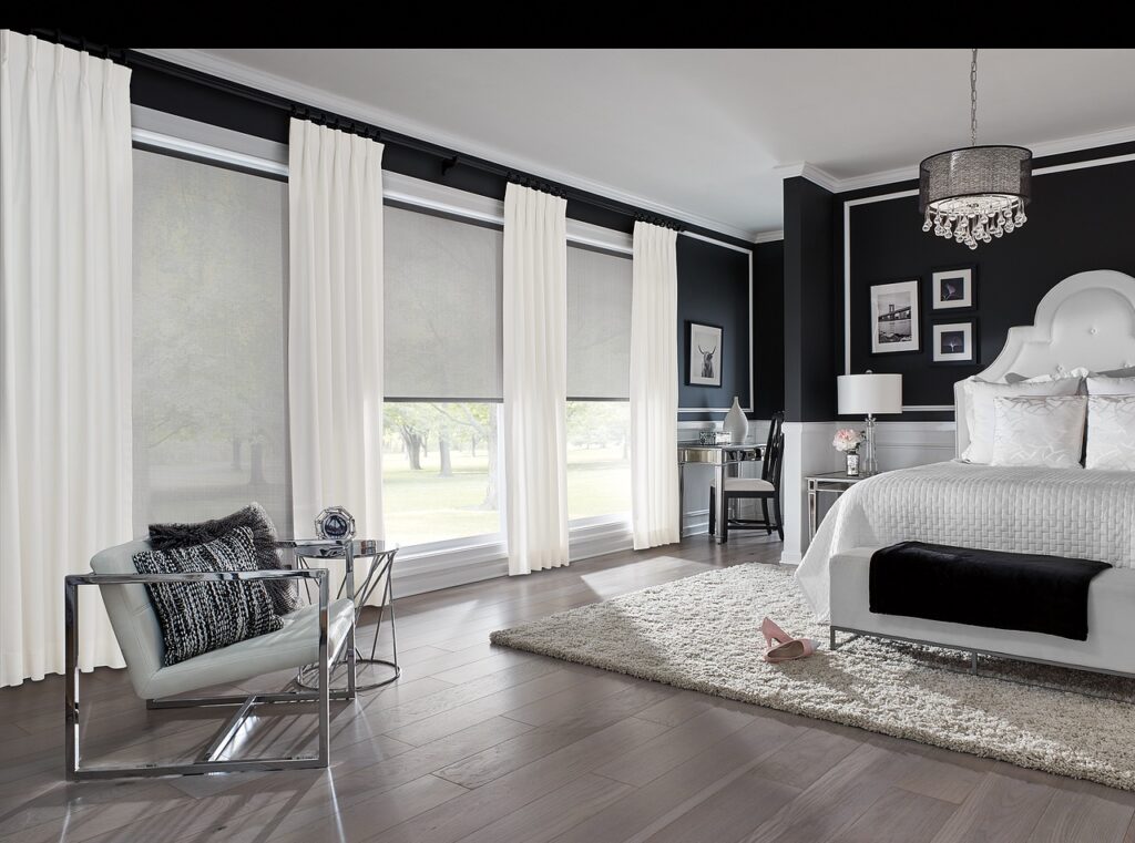 roller shades and white drapery